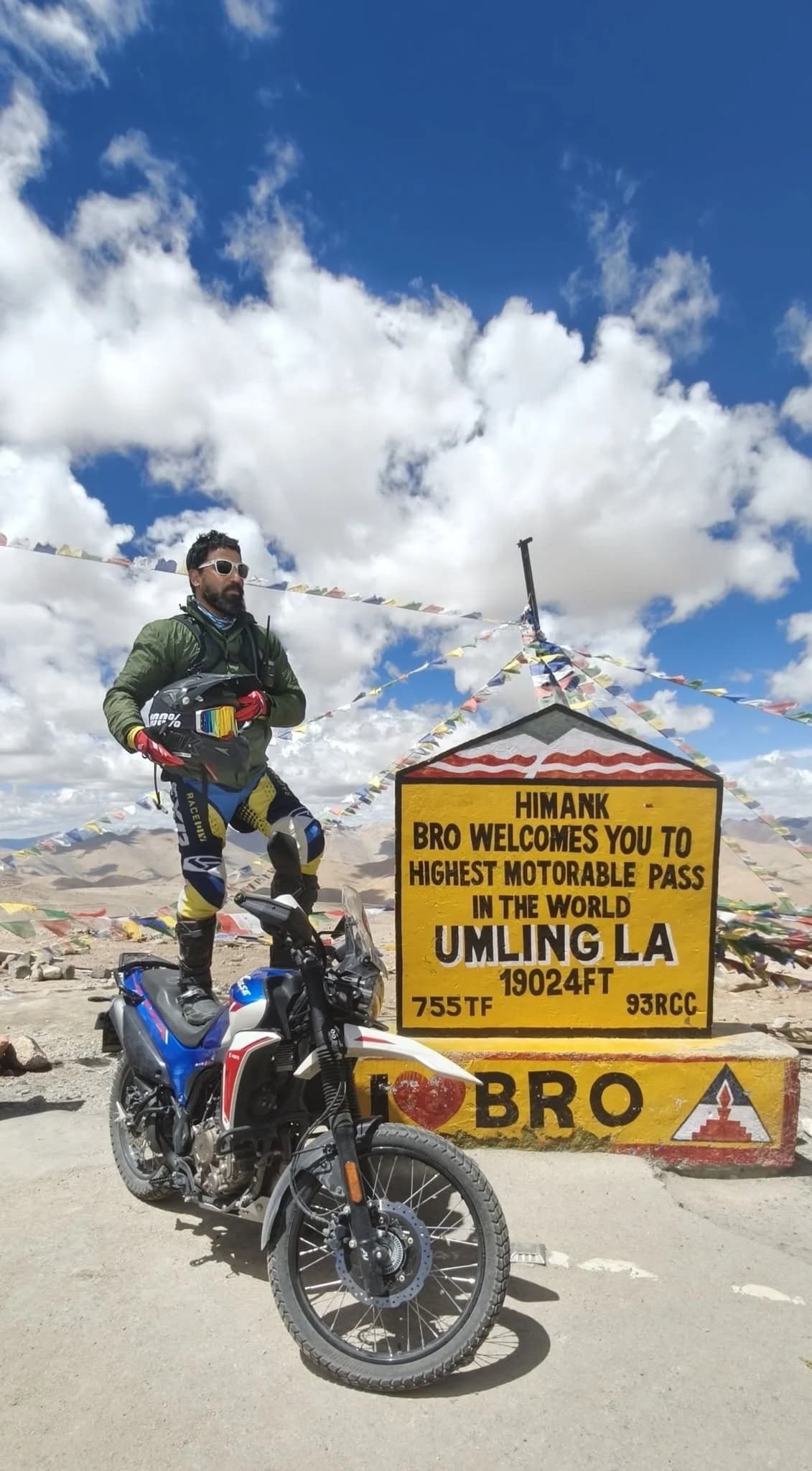 Prasanta Barik with his motorcycle at Umling La